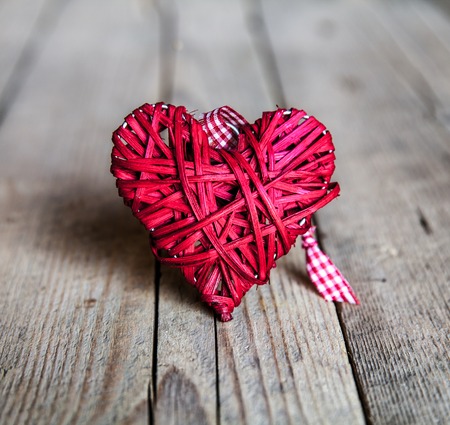 heart on a wooden background. Red, Valentine's Day, Day of the enamoredの写真素材