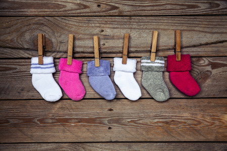 knitted  socks on a wooden background