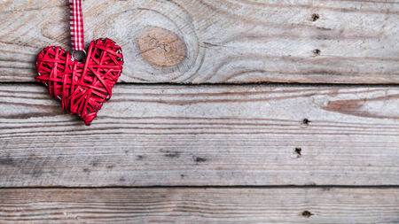 heart on a wooden background. Red, Valentine's Day, Day of the enamoredの写真素材