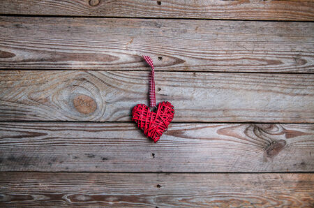 heart on a wooden background. Red, Valentine's Day, Day of the enamoredの写真素材