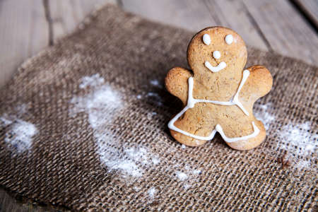 Christmas homemade gingerbread cookies on wooden tableの写真素材