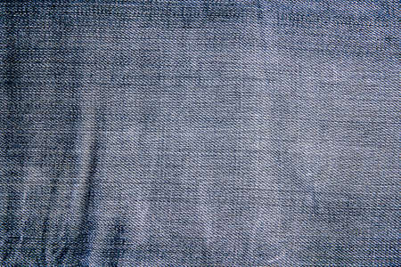 Texture of blue jeans textile close upの写真素材