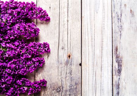The beautiful lilac on a wooden backgroundの写真素材