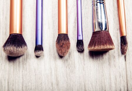 collection of make-up brushes over whiteの写真素材