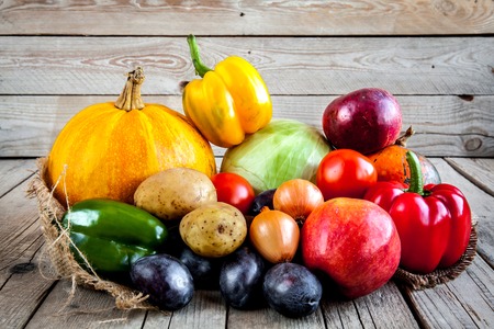 Fruits and vegetables with pumpkins in autumn vintage still lifeの写真素材