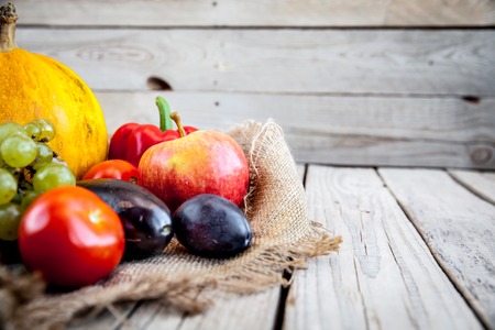 Fruits and vegetables with pumpkins in autumn vintage still lifeの写真素材