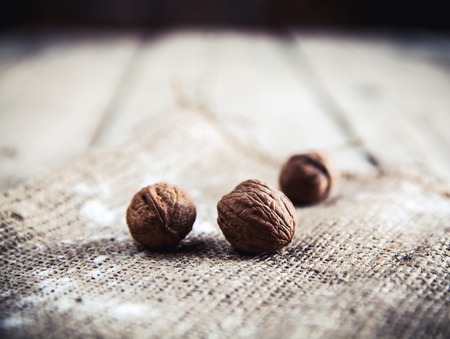nuts on a wooden backgroundの写真素材