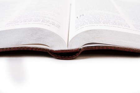 book pages with silver on a white backgroundの写真素材