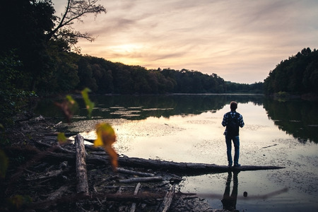 Tourist on the lake with forest. Element of design.