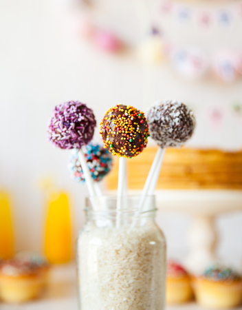 cake pops on the holiday table. sweetness. candies on wooden backgroundの写真素材