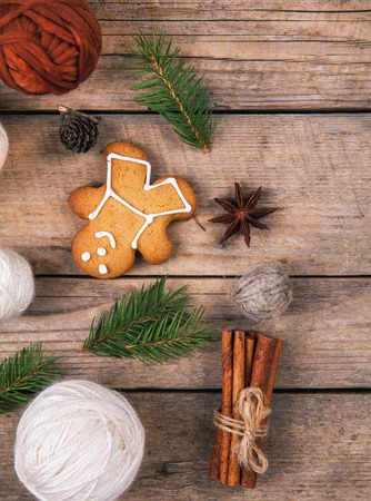 Christmas tree background with Christmas tree and gingerbread shaped cookies. selective focus