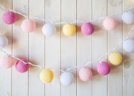 delicate, beautiful lanterns garlands like balls of yarn on a white background. decorationsの写真素材