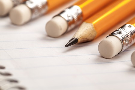 Pencils and a notebook up close