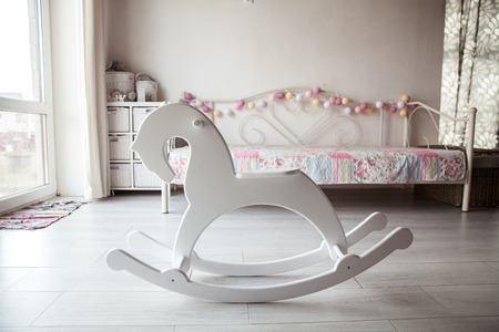 Beautiful wooden toy horse at home.の写真素材