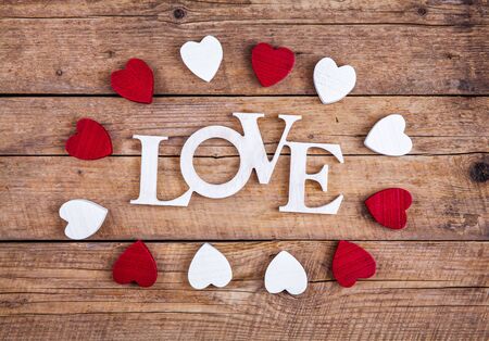 Word ''love'' on a old wood planks. St. Valentine's Dayの写真素材