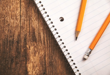 Pencils and a notebook up close