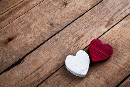 Wooden hearts on a wooden backgroundの写真素材