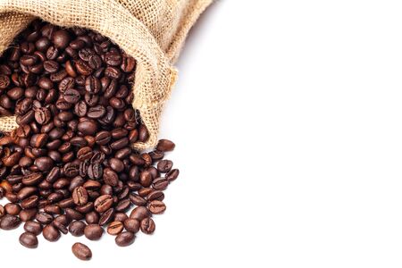 coffee beans in bag isolated on white backgroundの写真素材