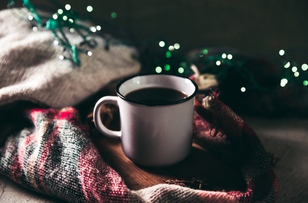 cup with herlands, Christmas and New Year, Cozy still life details in the living room. composition with Cupの写真素材