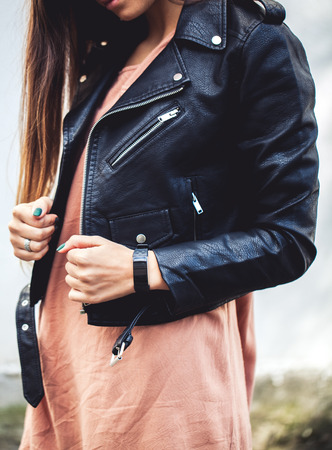 young woman wearing leather jacket, man, fashion, style aの写真素材