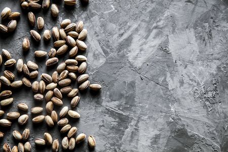 Big set of salted pistachios on the table. Pistachios nuts aの写真素材