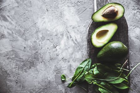 Avocado. Healthy food on the table. Rustic board.の写真素材