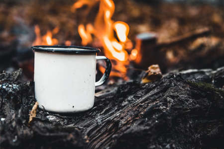 Making coffee at the stake. Make coffee or tea on the fire of nature. Burned fire. A place for fire. Ashes and coal.の写真素材