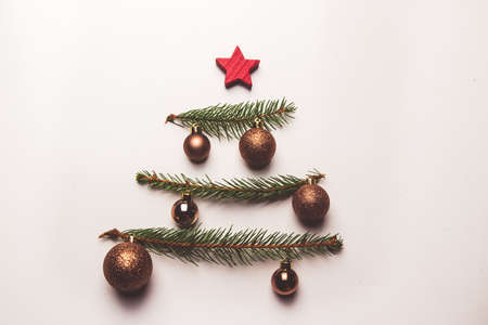 twigs of Christmas tree and toys from straw
