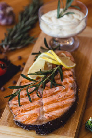 Salmon steak grilled with lemon