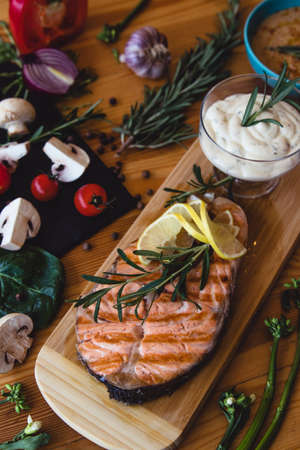 Salmon steak grilled with lemonの写真素材