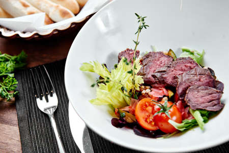 filet mignon on the grill with vegetablesの写真素材