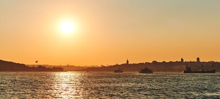 Bosphorus Bridge and Sunset. The city, ships on horizon. Summer