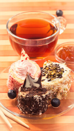 Sweet rolls with tea and apricot jamの写真素材
