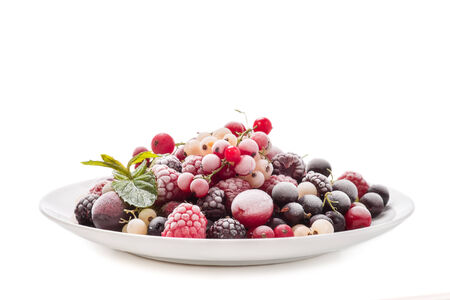 Frozen berries isolated on white backgroundの写真素材