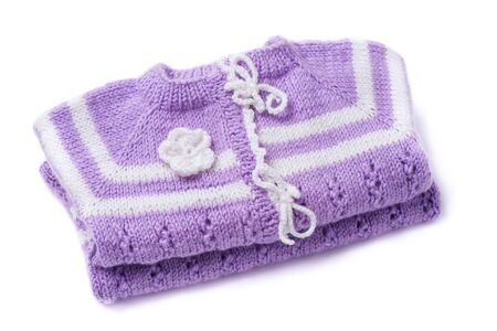 Knitted jacket for the baby isolated on a white background