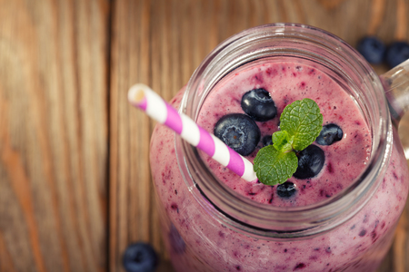 Smoothies with the addition of blueberries and mint. Space for textの写真素材