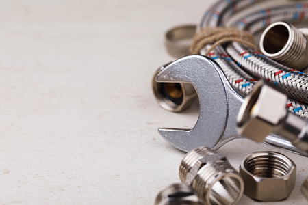 Plumbing tools for connecting water taps with space for text, closeupの写真素材