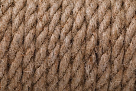 Texture of a rope made of flax closeup