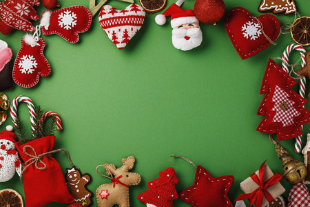 Christmas card with copy space. Top view of various soft toys for decorating a holidayの写真素材