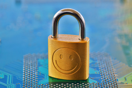 Digital security concept: Closed lock on a computer chip