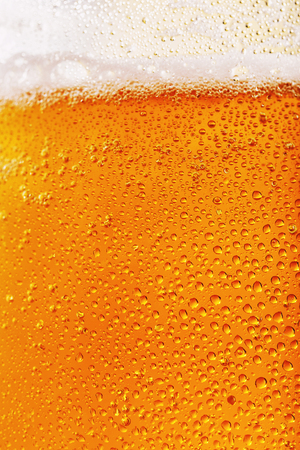 Texture of light filtered beer close upの写真素材