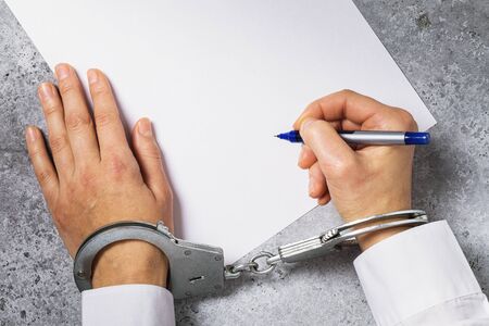 Concept on the topic of agreement under the influence of pressure on people.