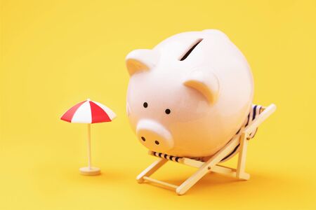 Piggy bank, deck chair and umbrella on a yellow background. Concept on accumulating vacation moneyの写真素材
