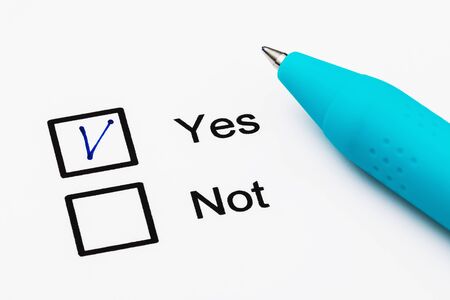 Pen and sheet of paper close-up. Positive Anonymous Survey Conceptの写真素材