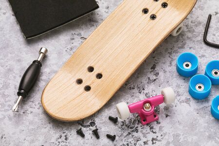Fingerboard, chassis and wheels with repair toolsの写真素材
