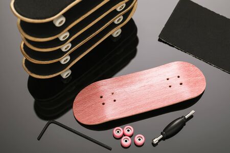 Fingerboards surrounded by instruments. Concept on repairing little skateboardsの写真素材