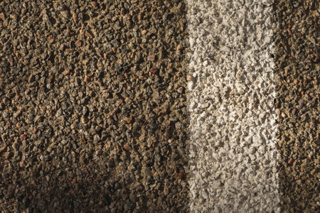 Background from asphalt and dividing strip, top viewの写真素材
