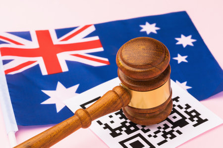 Judge gavel, barcode sheet and Australian flag, the concept of administrative punishment for...