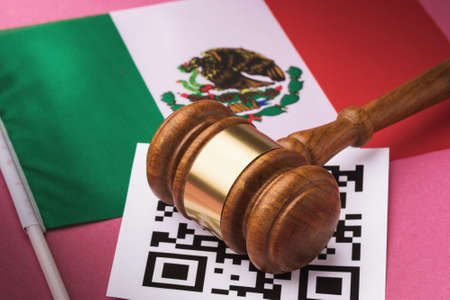 Judge gavel, barcode sheet and Mexican flag, the concept of administrative punishment for violation of the regime using QR-codes in Mexicoの写真素材
