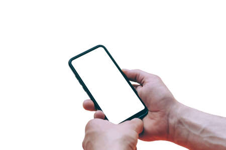 Mock-up technology. Man holds a smartphone in his hands close-upの写真素材